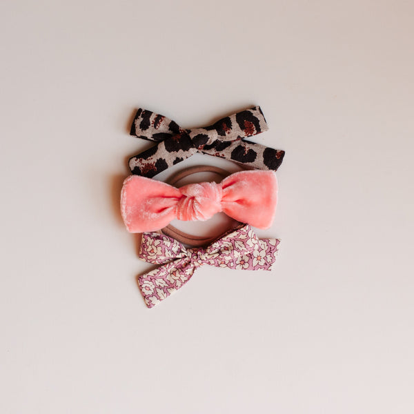 Set of decorative hair bows on a light background