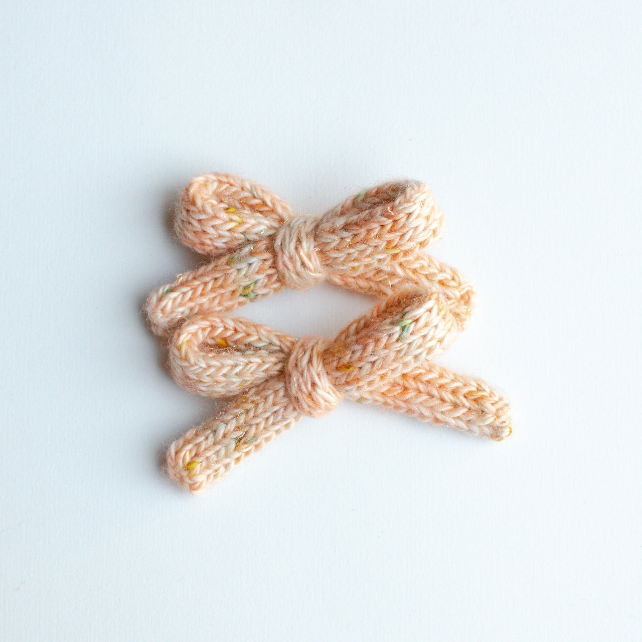 Tinsel Oatmeal | knitted bows