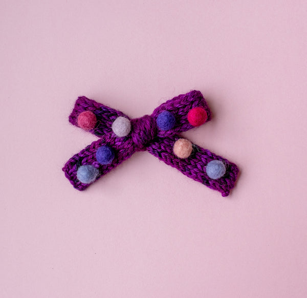 Poms on Purple | sweater bows